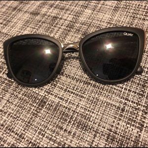 Black Quay sunglasses with silver accents.